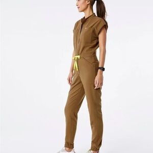Figs Brown Jumpsuit Neon
Yellow Accents. Color Earth. Scrubs Nursing. BRAND NEW.